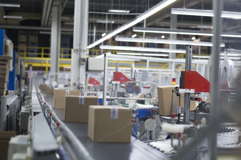 boxes-on-production-line-at-paper-packaging-factor-2024-10-19-21-48-26-utc